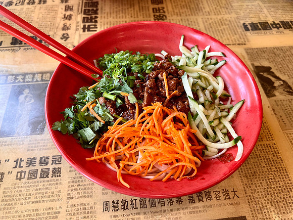 Za Jiang Mian: Classic Northern Chinese noodle dish. Ma Ma makes it with fresh organic egg noodle topped with savory ground pork sauce and julienne vegetables.